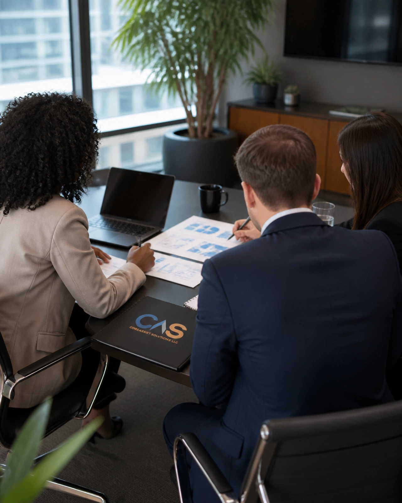 A consulting meeting in progress around a conference table